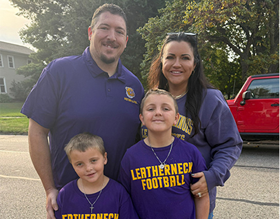 Carissa Bryant and her family in purple shirts