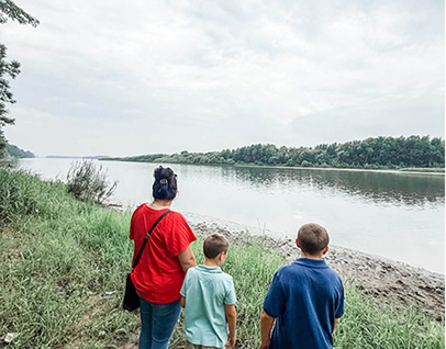 Carissa Bryant and her sons at a lake
